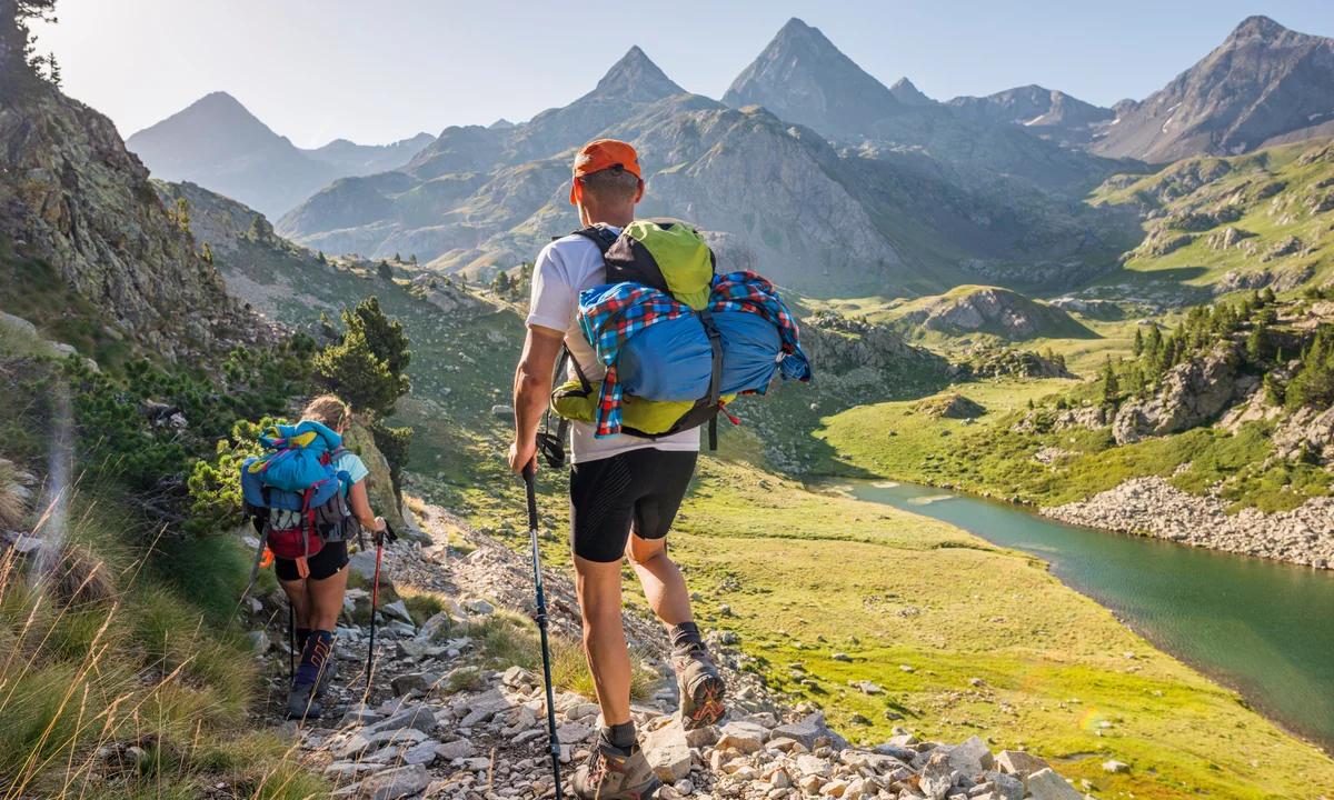 Person hiking on a mountain trail